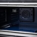 Forno Capriasca 36 Inch Freestanding French Door Dual Fuel Range in Black with Antique Brass Accessories, 6 Burners, True Convection Oven